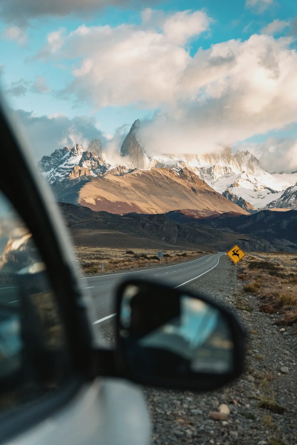 Mountain road seen in the side mirror